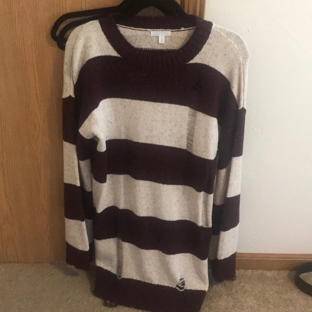 Long ripped sweater